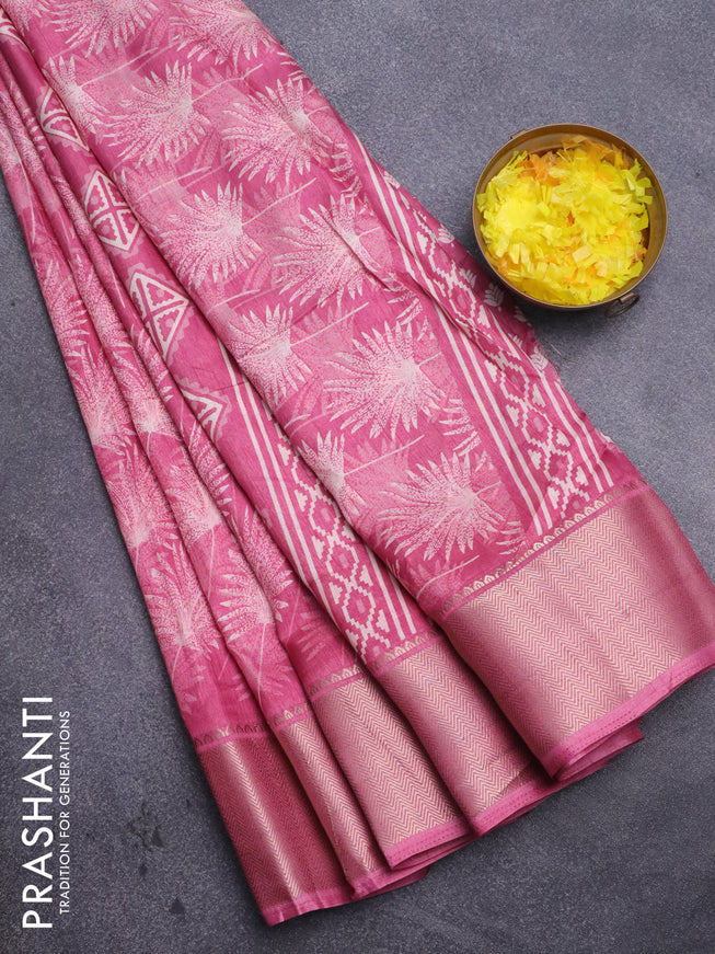 Semi dola saree pink shade with allover prints and zari woven border