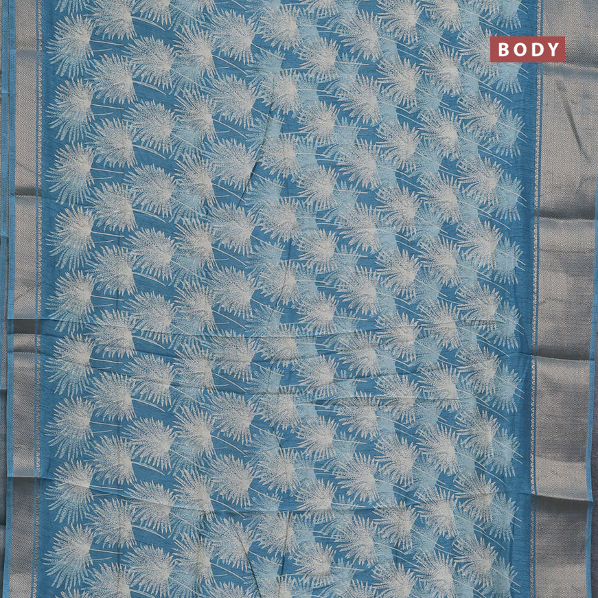 Semi dola saree blue shade with allover prints and zari woven border