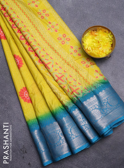 Semi dola saree lime yellow and cs blue with allover zari weaves & floral digital butta prints and zari woven border