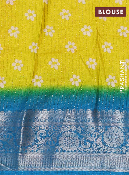 Semi dola saree lime yellow and cs blue with allover zari weaves & floral digital butta prints and zari woven border