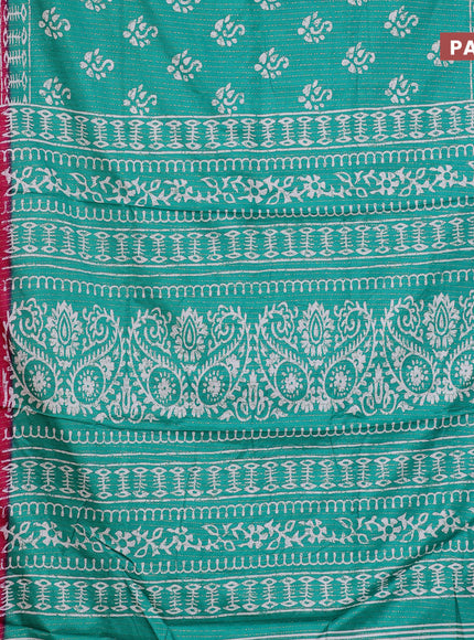 Semi dola saree teal green and pink with allover zari weaves & batik butta prints and zari woven border