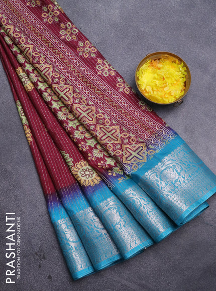 Semi dola saree deep maroon and cs blue with allover zari weaves & floral digital butta prints and zari woven border