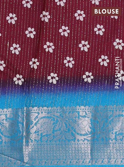 Semi dola saree deep maroon and cs blue with allover zari weaves & floral digital butta prints and zari woven border