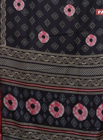 Semi dola saree black and red with allover bandhani prints and zari woven border