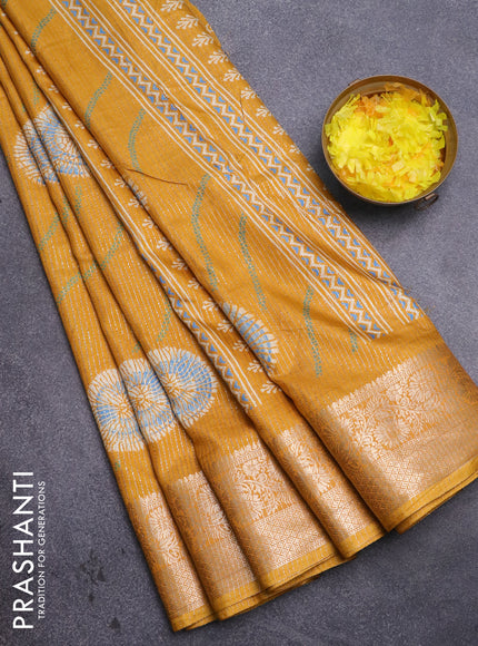 Semi dola saree mustard yellow with allover zari weaves & prints and zari woven border