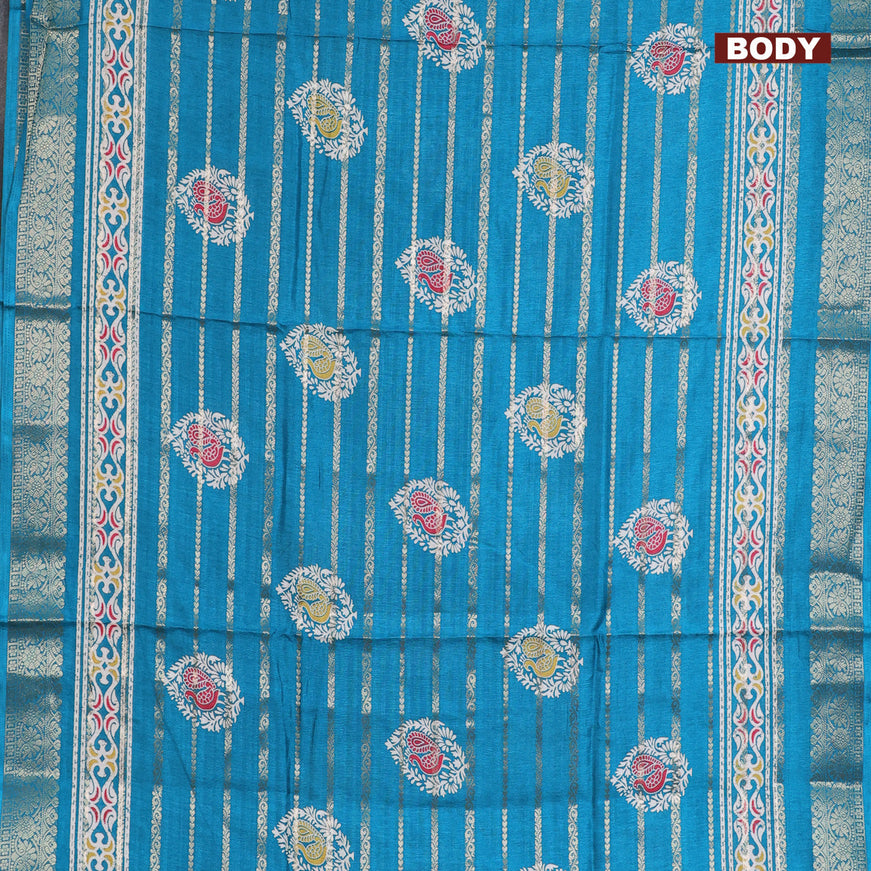 Semi dola saree teal blue with allover zari strips & butta prints and zari woven border