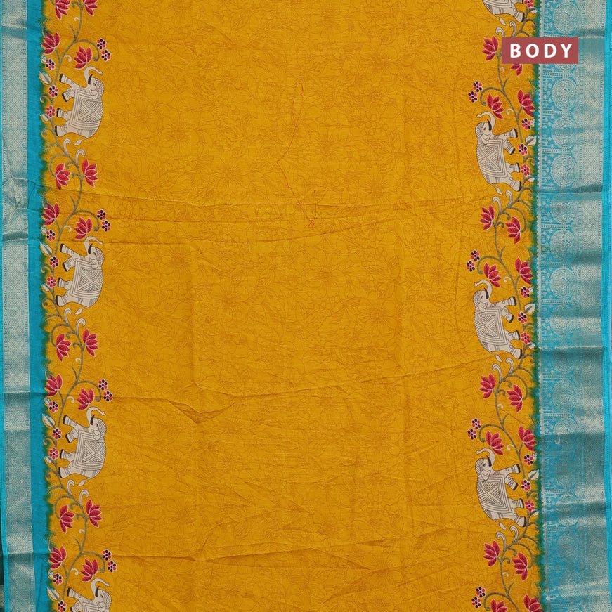 Semi dola saree mustard yelllow and teal green shade with allover prints and zari woven border