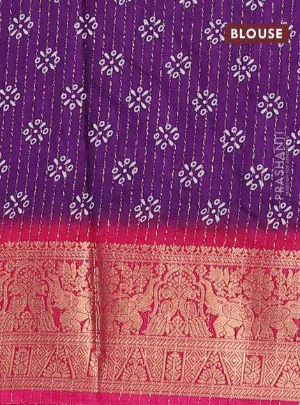 Semi dola saree violet and pink with allover zari weaves & butta prints and zari woven border