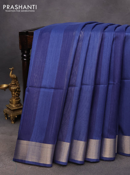 Semi tussar saree blue with plain body & madhubani printed pallu and zari woven border