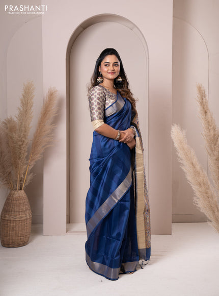 Semi tussar saree blue with plain body & madhubani printed pallu and zari woven border