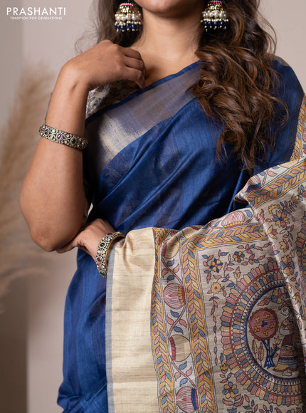 Semi tussar saree blue with plain body & madhubani printed pallu and zari woven border