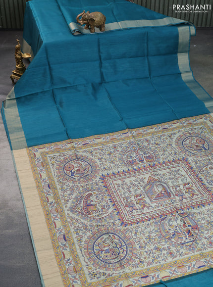 Semi tussar saree teal blue with plain body & madhubani printed pallu and zari woven border