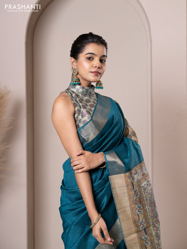 Semi tussar saree teal blue with plain body & madhubani printed pallu and zari woven border