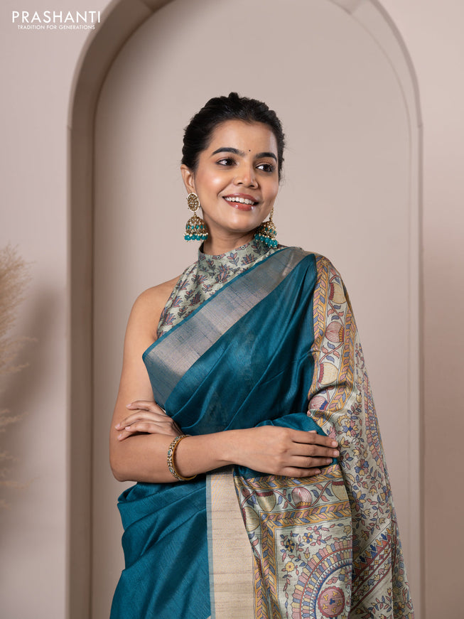 Semi tussar saree teal blue with plain body & madhubani printed pallu and zari woven border