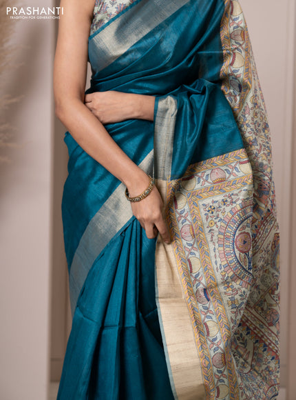 Semi tussar saree teal blue with plain body & madhubani printed pallu and zari woven border