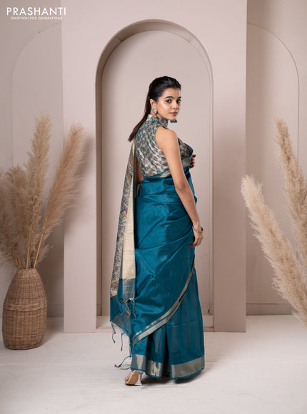 Semi tussar saree teal blue with plain body & madhubani printed pallu and zari woven border