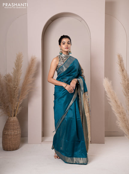 Semi tussar saree teal blue with plain body & madhubani printed pallu and zari woven border