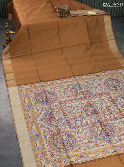 Semi tussar saree brown shade with plain body & madhubani printed pallu and zari woven border