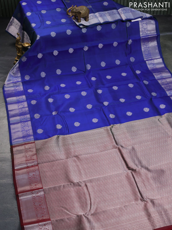 Pure kanchipuram silk saree dual shade of blue and maroon with silver zari woven buttas and silver zari woven border