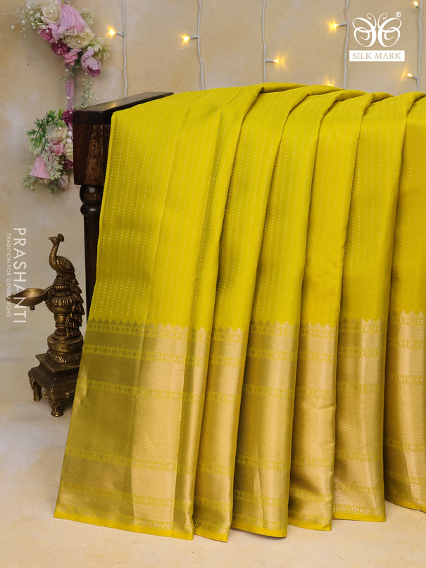 Pure kanchipuram silk saree lime yellow and magenta pink with allover silver zari weaves and long zari woven border