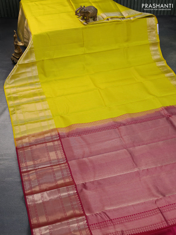 Pure kanchipuram silk saree lime yellow and magenta pink with allover silver zari weaves and long zari woven border