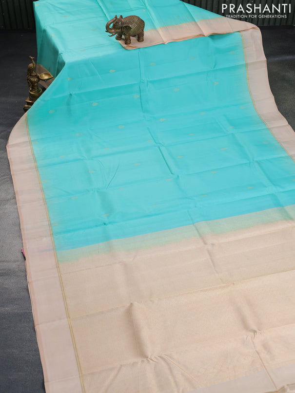 Pure kanchipuram silk saree teal blue and sandal with zari woven buttas and zari woven simple border