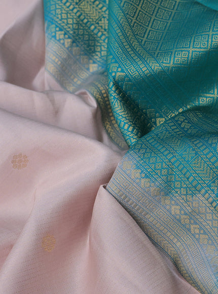 Pure kanchipuram silk saree beige and green with allover zari weaves and zari woven butta border