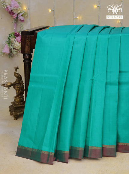 Pure kanchipuram silk saree teal green and dual shade of maroon with zari woven buttas and zari woven simple border