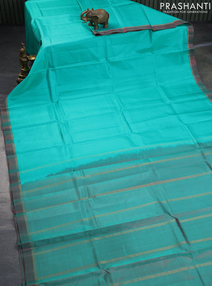 Pure kanchipuram silk saree teal green and dual shade of maroon with zari woven buttas and zari woven simple border