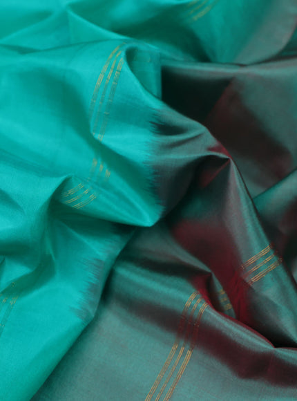 Pure kanchipuram silk saree teal green and dual shade of maroon with zari woven buttas and zari woven simple border