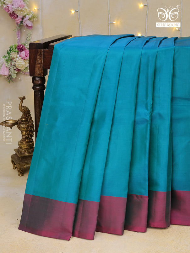 Pure kanchipuram silk saree teal blue and dual shade of pink with plain body and simple border