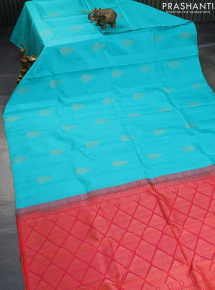 Pure kanchipuram silk saree teal blue and dual shade of pinkish orange with zari woven buttas in borderless style