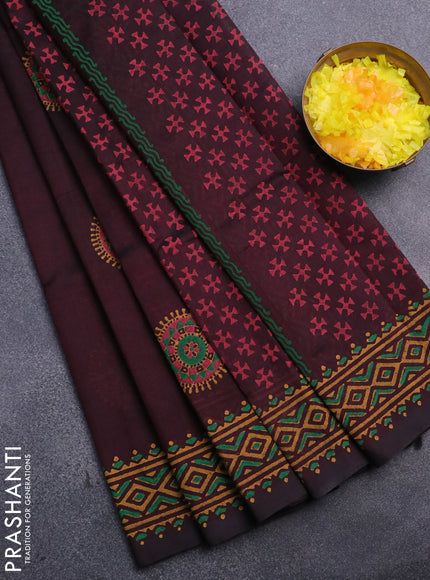 Silk cotton block printed saree jamun shade with butta prints and printed border