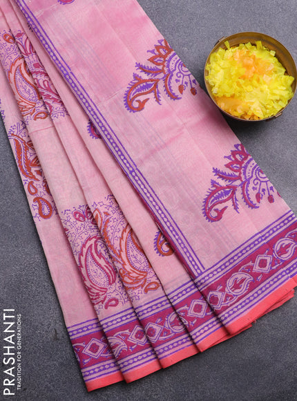 Silk cotton block printed saree light pink and peach red with allover prints and printed border