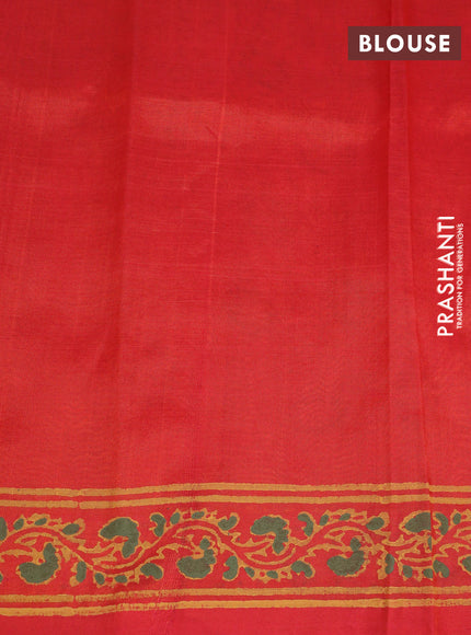 Silk cotton block printed saree reddish orange with allover prints and printed border