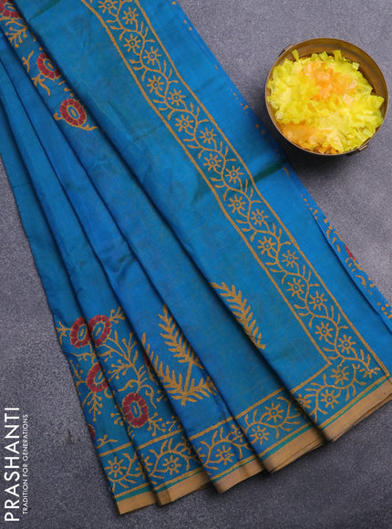 Silk cotton block printed saree dual shade of bluish green and dark mustard with floral butta prints and printed border