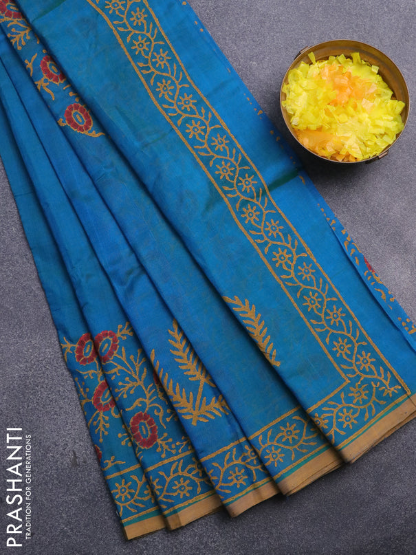 Silk cotton block printed saree dual shade of bluish green and dark mustard with floral butta prints and printed border