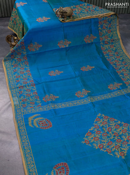 Silk cotton block printed saree dual shade of bluish green and dark mustard with floral butta prints and printed border