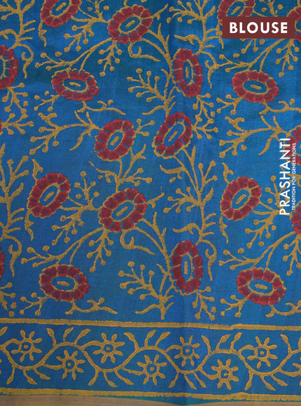 Silk cotton block printed saree dual shade of bluish green and dark mustard with floral butta prints and printed border