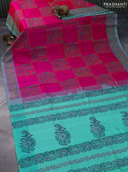 Silk cotton block printed saree pink and teal green with allover prints and printed border