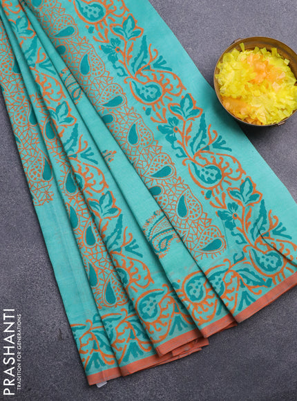 Silk cotton block printed saree teal blue and orange with allover prints and printed border