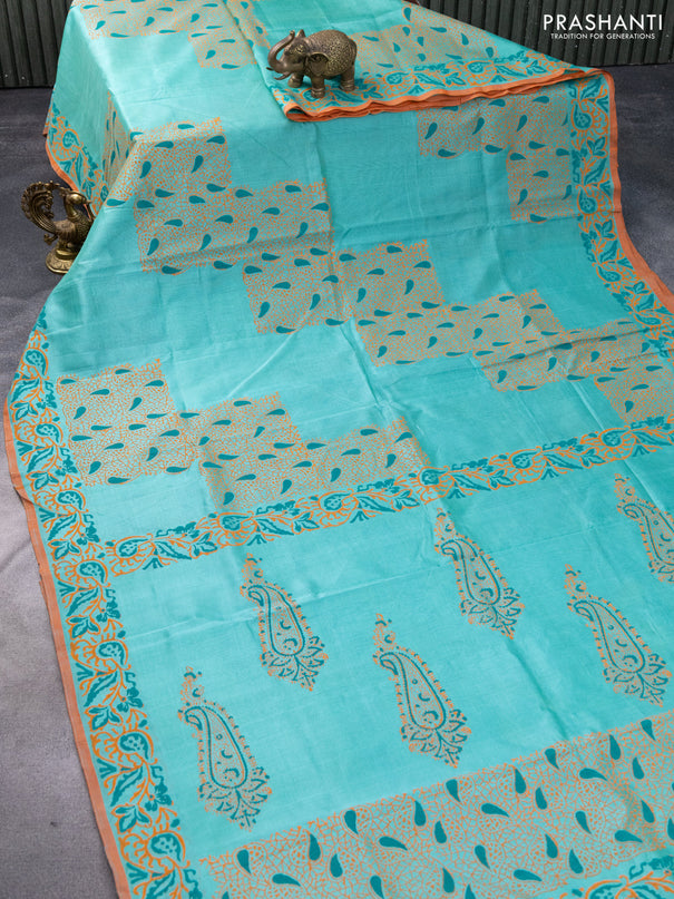 Silk cotton block printed saree teal blue and orange with allover prints and printed border