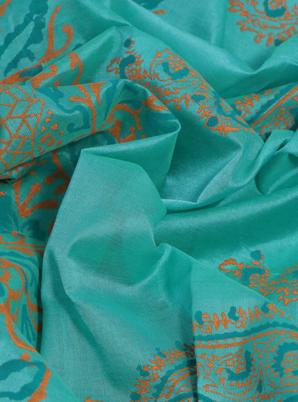 Silk cotton block printed saree teal blue and orange with allover prints and printed border