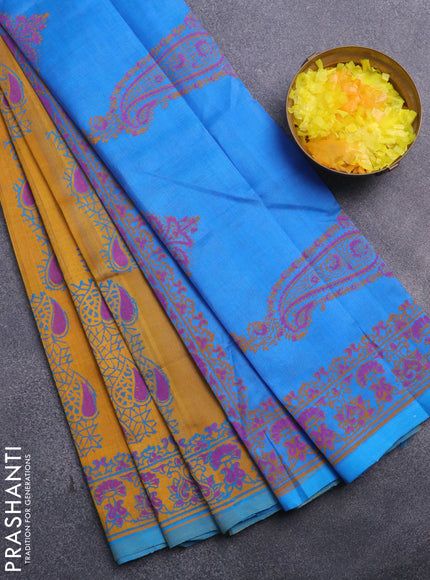 Silk cotton block printed saree mustard yellow and light blue with allover butta prints and printed border