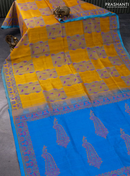 Silk cotton block printed saree mustard yellow and light blue with allover butta prints and printed border