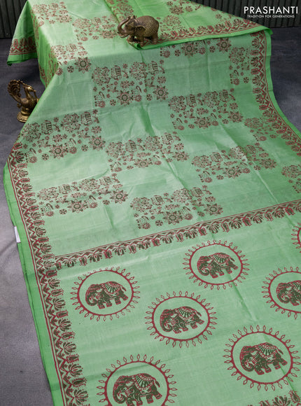 Silk cotton block printed saree green with allover box type butta prints and printed border