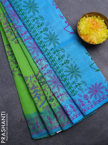 Silk cotton block printed saree light green and light blue with allover warli prints and printed border