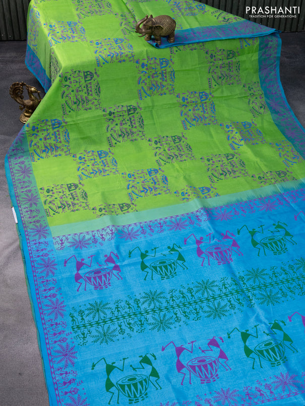 Silk cotton block printed saree light green and light blue with allover warli prints and printed border