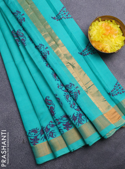 Silk cotton block printed saree teal blue shade with butta prints and zari woven border