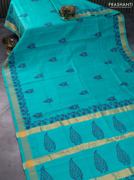 Silk cotton block printed saree teal blue shade with butta prints and zari woven border